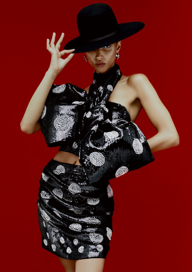 Top and skirt in recycled polyester and glass, €129 and €140 respectively; recycled wool hat, €39.99