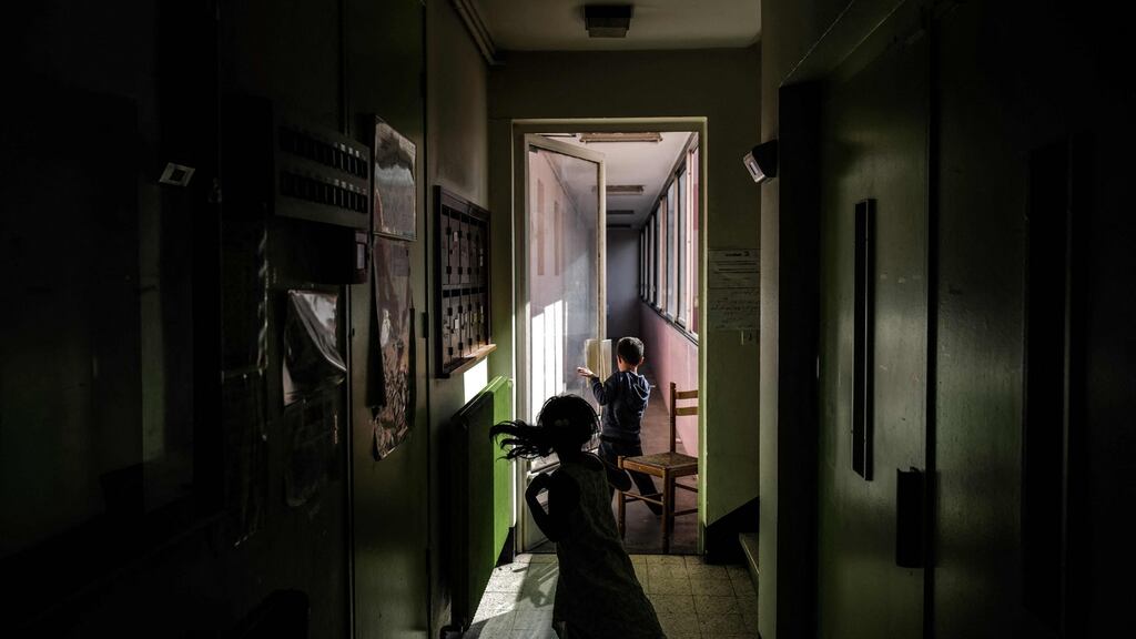 Children play in a corridor of a building, as Afghan refugee families just arrived after their evacuation from Kabul in Villeurbanne, near Lyon, on August 31st. Photograph: AFP via Getty Images
