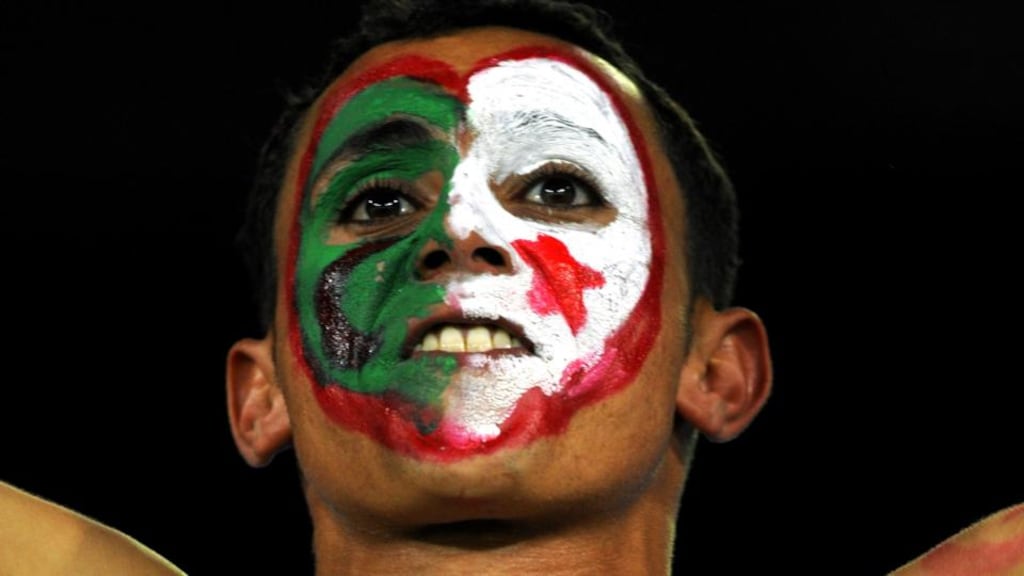 An Algerian supporter at the semi-final match of the African Cupin 2010. Photograph: Gianluigi Guercia/AFP/Getty Images
