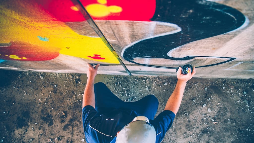 I knew it was time to leave before someone would uncover the artist behind my piece. I threw the empty can on the ground, and kicked it against a rock. Photograph: iStock