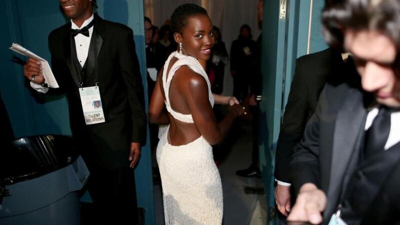 Last year’s Oscars red carpet star, Lupita Nyongo, was a pearly queen in a custom gown created by Francisco Costa. The dress featured more than 6,000 pearls and looked like it weighed a ton, but Nyongo pulled it off with a grace only she could manage.
Photograph: Getty Images