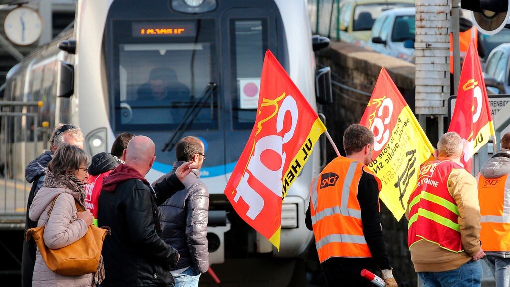 Rail workers of CGT union demonstrate in Hendaye, southwestern France against government plans to redesign the national retirement system. Photograph: AP Photo/Bob Edme