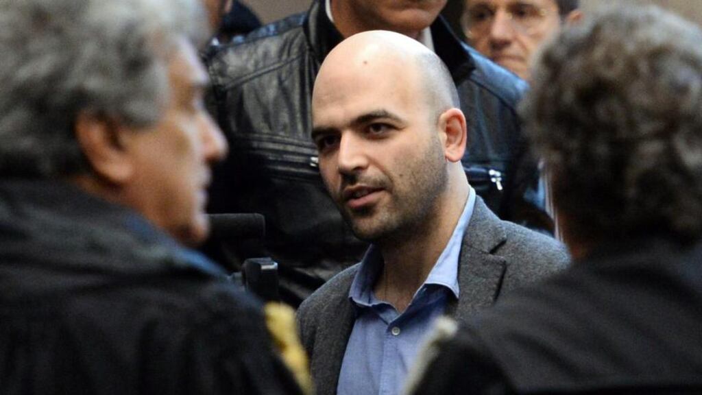 Italian writer Roberto Saviano (centre): ‘Asked on television this week if this week’s court ruling had tempted him to leave Italy, Saviano’s reply to the programme presenter was nothing if not eloquently laconic, saying: “And were you tempted to leave?”.’ Photograph: EPA/CIRO FUSCO