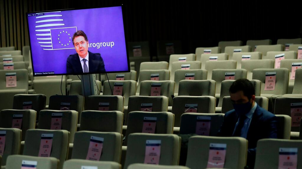 Eurogroup president Paschal Donohoe, on the screen, speaks during an online news conference following a Eurogroup video conference meeting at the European Council headquarters in Brussels, on November 30th. Photograph: Francisco Seco/Pool/AFP