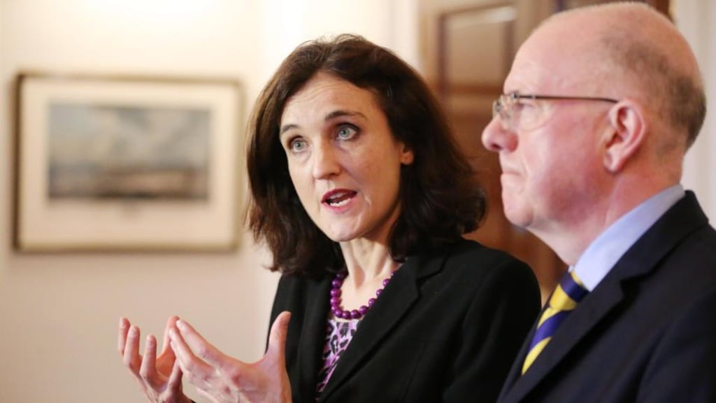 Secretary of State for Northern Ireland Theresa Villiers with Minister for Foreign Affairs Charles Flanagan after the agreement had been concluded. Photograph: Kelvin Boyes/Press Eye.