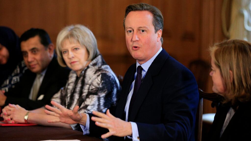 Then British prime minister David Cameron alongside with current prime minister Theresa May in this October 2015 photo.  Mr Cameron’s team dubbed her “Submarine May” for disappearing when she was needed, according to a new book. Photograph: Jonathan Brady/PA Wire