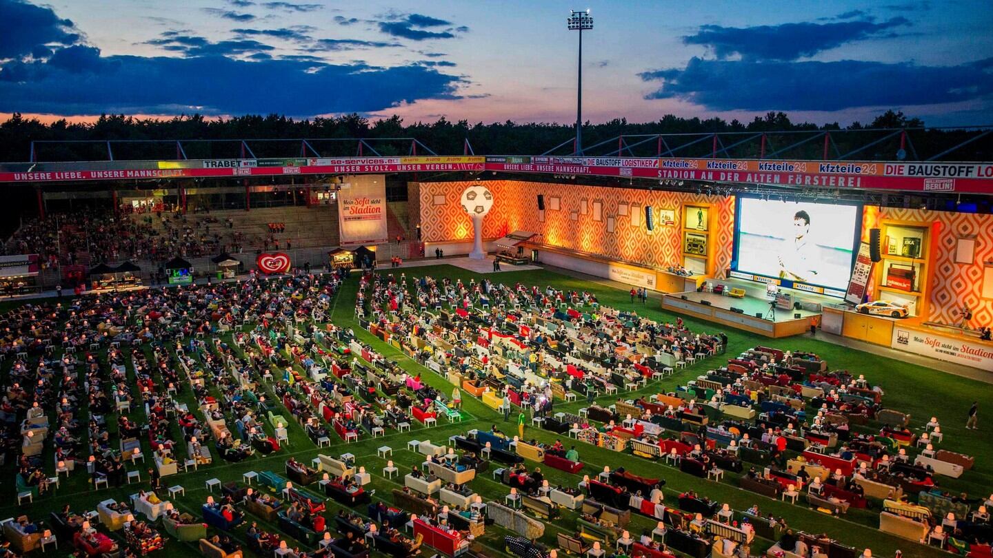 Berlin’s Union soccer club has invited its supporters to bring their sofas to its stadium to watch World Cup soccer matches on a giant screen in a communal ‘living room’ atmosphere. Photograph: Thomas Peter/Reuters