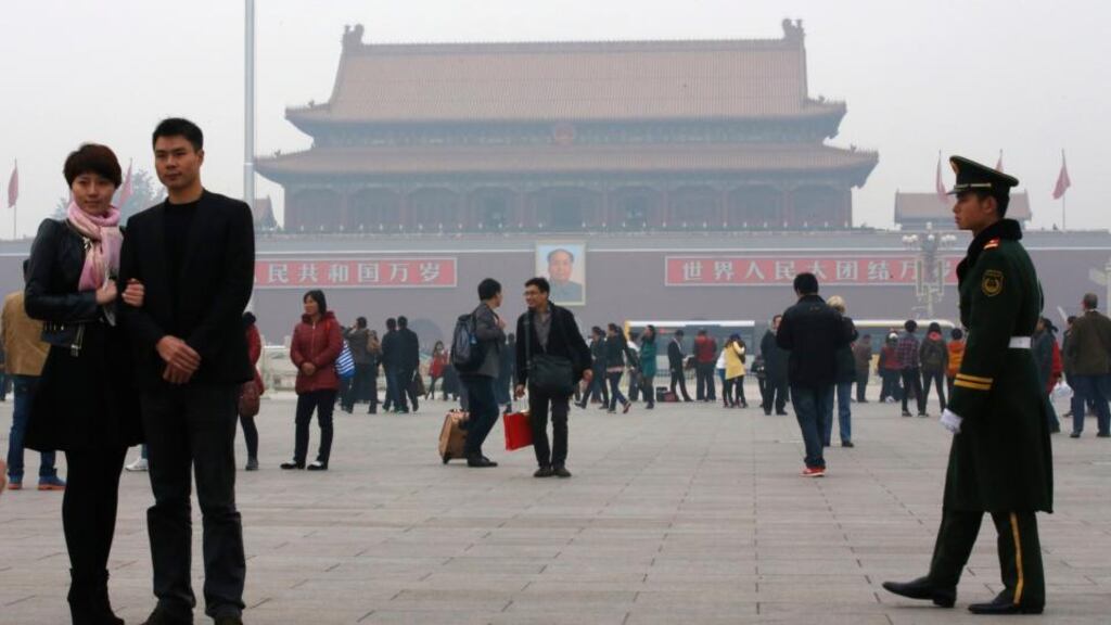 Smog around Tiananmen Square, Beijing: pollution is starting to eat into tourism income as the number of visitors to China’s capital declined by a hefty 50 per cent in the first three quarters of the year compared to a year earlier. photograph: kim kyung-hoon/reuters