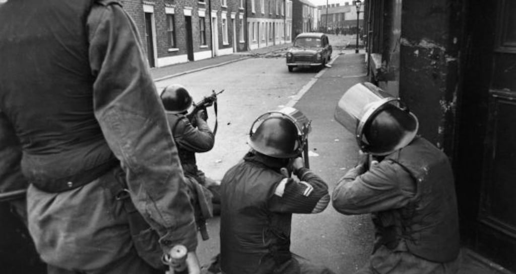 British soldiers take aim at civil rights demonstrators in the Falls Road, Belfast, 1970. File photograph: Malcolm Stroud/Express/Getty Images