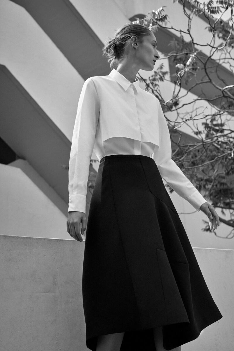 Skirt in pure Italian wool, €99, and white shirt in pure cotton, €69