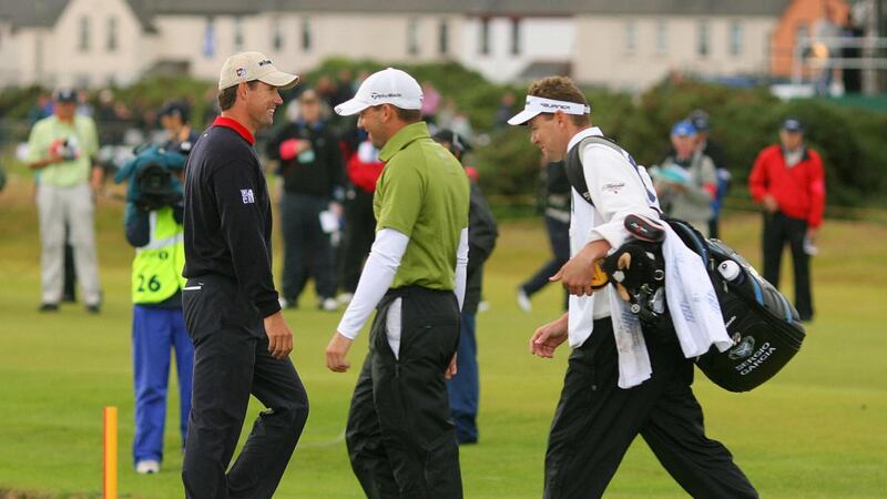Pádráig Harrington and Sergio Garcia smile as they walk past each other   on the 18th hole during the final round of the British Open at Carnoustie in 2007. Photograph: Carl de Souza/AFP/Getty Images