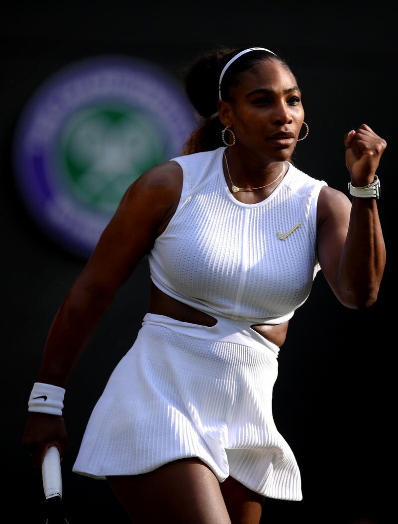 Serena Williams bends the dress-code rules at Wimbledon, in her whites with cutouts and decorative Nike ‘broosh’. Photograph: Laurence Griffiths/Getty Images