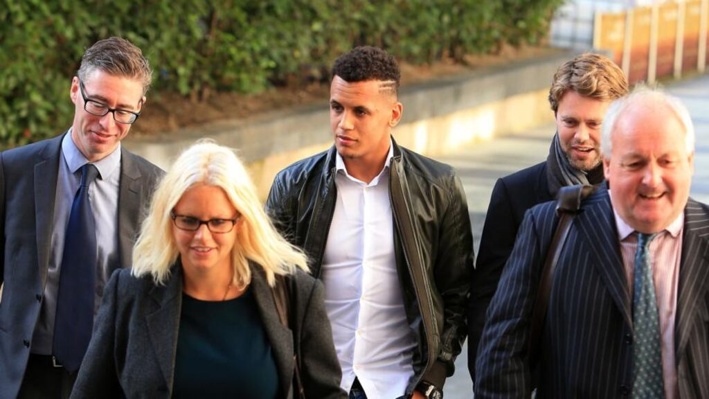 Premier League footballer Ravel Morrison (back centre) arrives at Manchester Crown Court where he faces charges of assault on his ex-girlfriend. Photograph: Peter Byrne/PA Wire