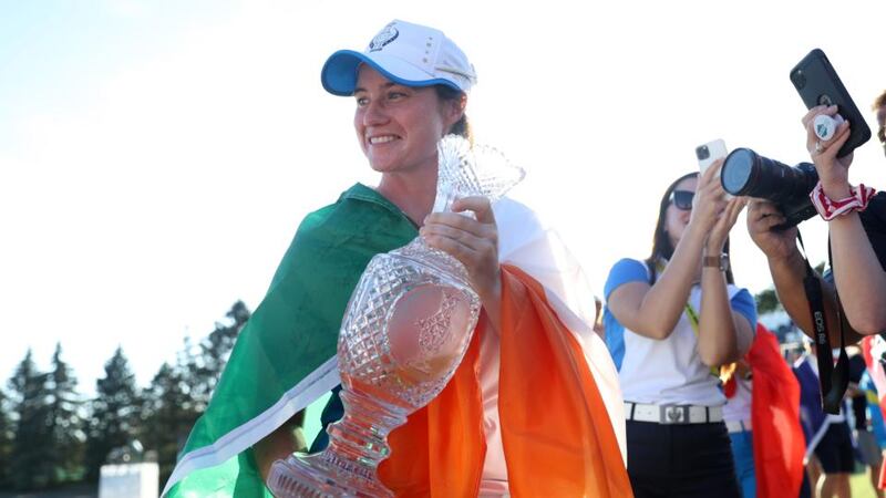 Leona Maguire celebrates with the Solheim Cup after driving Europe’s victory over the US  in Toledo, Ohio. Photograph: Maddie Meyer/Getty Images