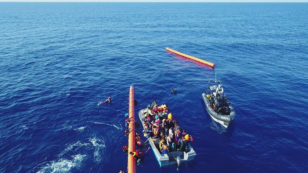 LÉ Eithne crewmembers help to rescue 183 migrants 40km northwest of Tripoli, Libya, during two separate operations on Sunday. Photograph: Defence Forces