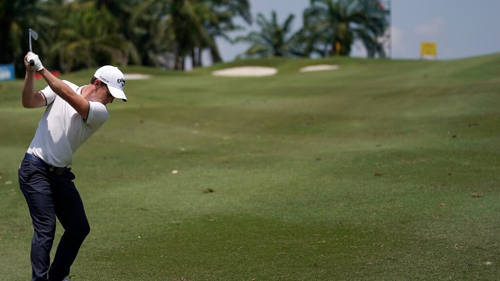 Chris Paisley of England plays a shot during day one of the 2018 Maybank Championship at Saujana Golf and Country Club in Kuala Lumpur, Malaysia. Photo: Stanley Chou/Getty Images