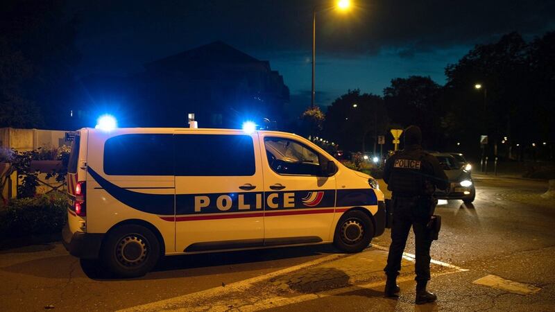 French police officers stand guard a street in Eragny on October 16th, where an attacker was shot dead by policemen after he decapitated a man earlier on the same day in Conflans-Sainte-Honorine. Photograph: Abdulmonam Eassa/AFP via Getty