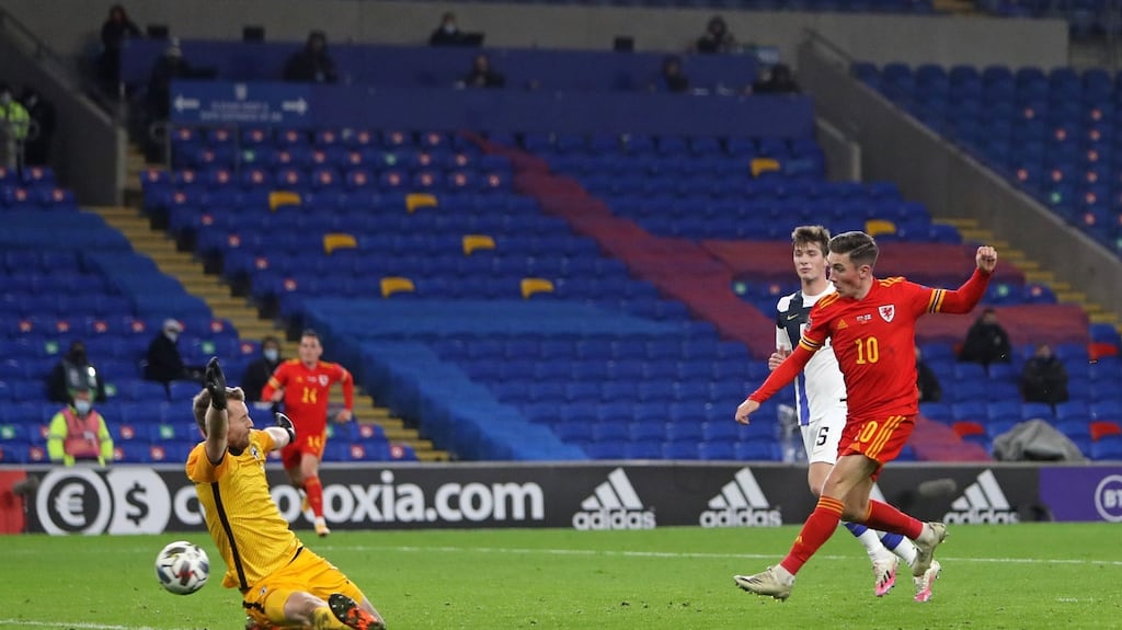 Wales’ midfielder Harry Wilson shoots past Finland goalkeeper Lukas Hradecky to score the opening goal of the Uefa Nations League match at Cardiff City Stadium. Photograph: Geoff Caddick/AFP via Getty Images