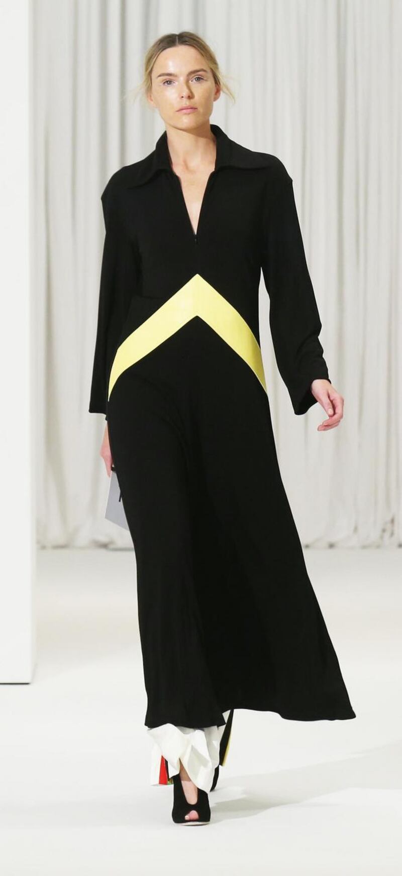 Dramatic black and yellow coat by Celine