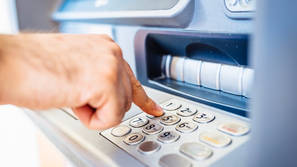 A man posing as a PhoneWatch worker reportedly used a homeowner’s bank card to withdraw €700 from an ATM. File photograph: Getty Images/iStockphoto