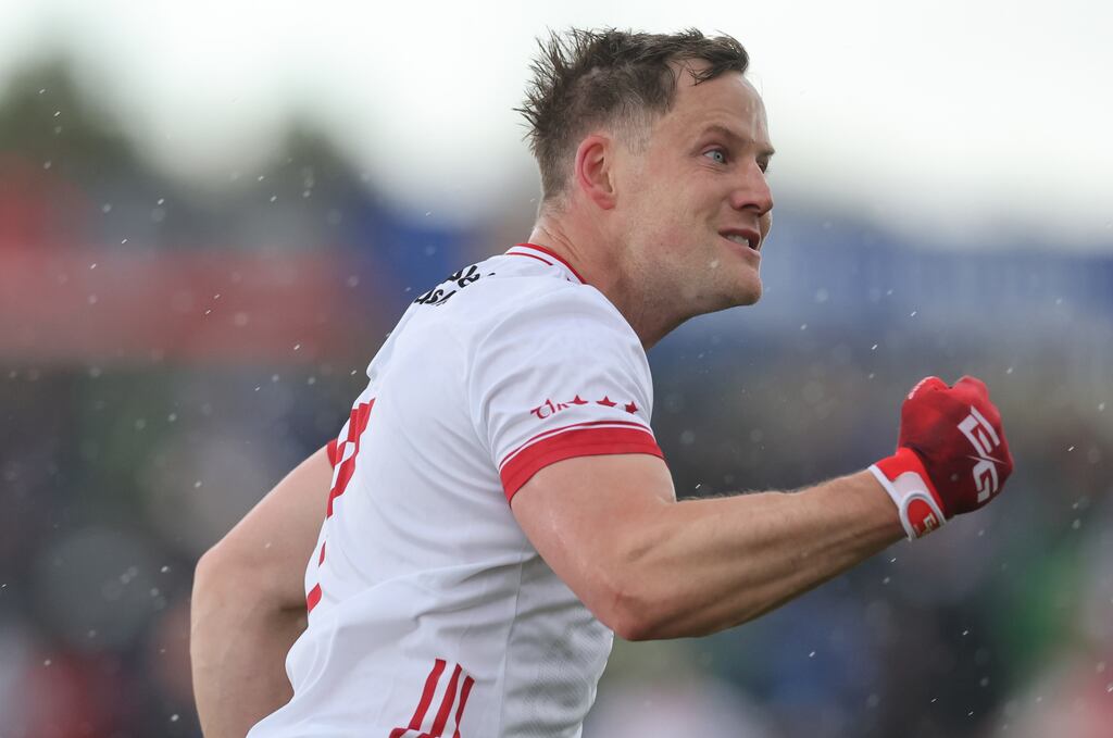 Kieran McGeary celebrates scoring a point for Tyrone in Sunday's victory over Cavan. Photograph: James Crombie/Inpho