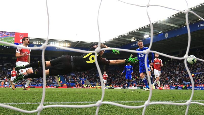 Jamie Vardy scores Leicester’s third against Arsenal. Photograph: Marc Atkins/Getty
