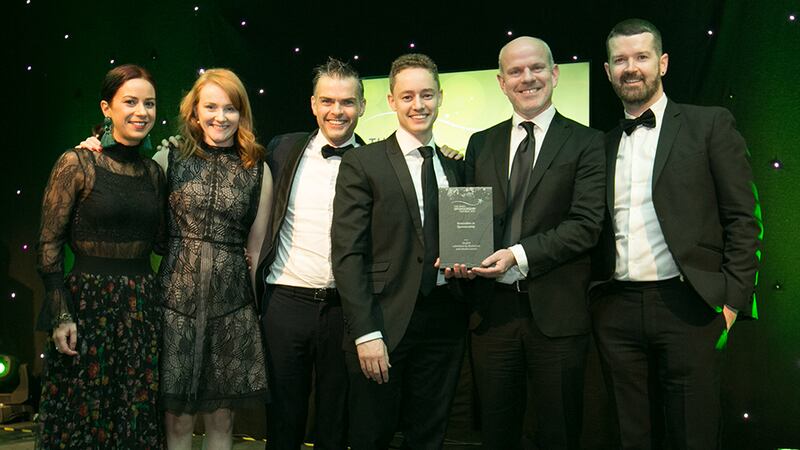 Noel Martyn Head of Sport, Livewire, presents Innovation in Sponsorship award to the MediaCom, Media Central and Universal team.