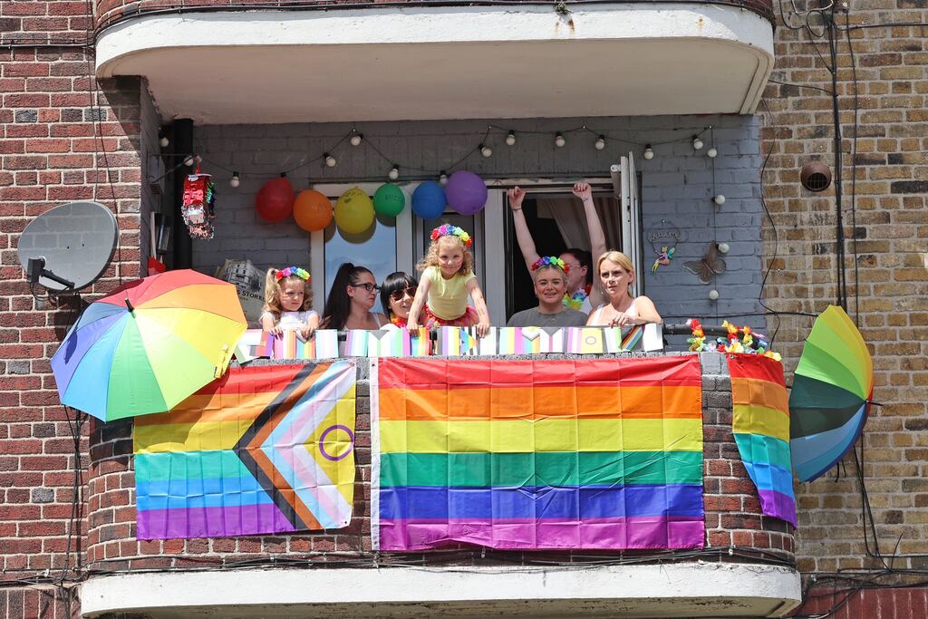 Residents in East Lombard Street in Dublin ahead of the Dublin Pride parade on Saturday. Pride is a celebration; it’s also a protest. There’s pageantry, glamour and fun but, for many of us, that coexists alongside grief, pain and trauma. Photograph: Nick Bradshaw/PA Wire
