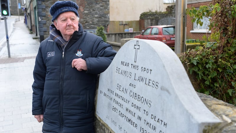 Jimmy Lawless, grandson of Séamus Lawless who was murdered by the Black and Tans in January 1920, at the spot he was killed on Bridge Street, Balbriggan. Photograph: Dara Mac Dónaill/The Irish Times