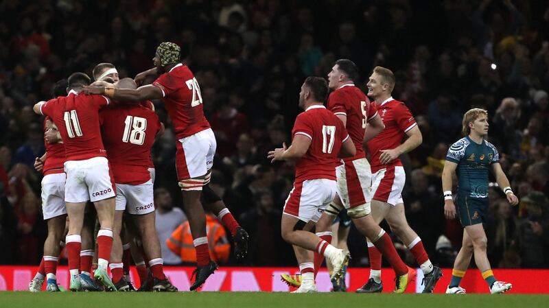 Wales celebrate their late win over the Wallabies. Photograph: Geoff Caddick/Getty/AFP
