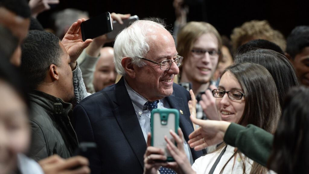US senator and Democratic presidential hopeful Bernie Sanders is surrounded by students following a town hall meeting at Dartmouth College in Hanover, New Hampshire. Photograph: CJ Gunther/EPA