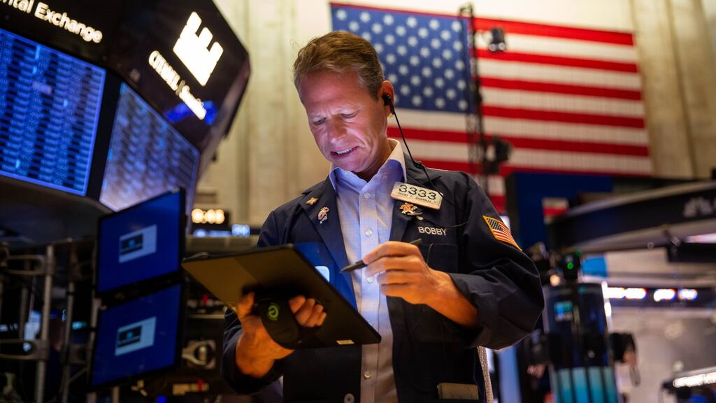 A trader works on the floor of the New York Stock Exchange. Photograph: Michael Nagle/Bloomberg