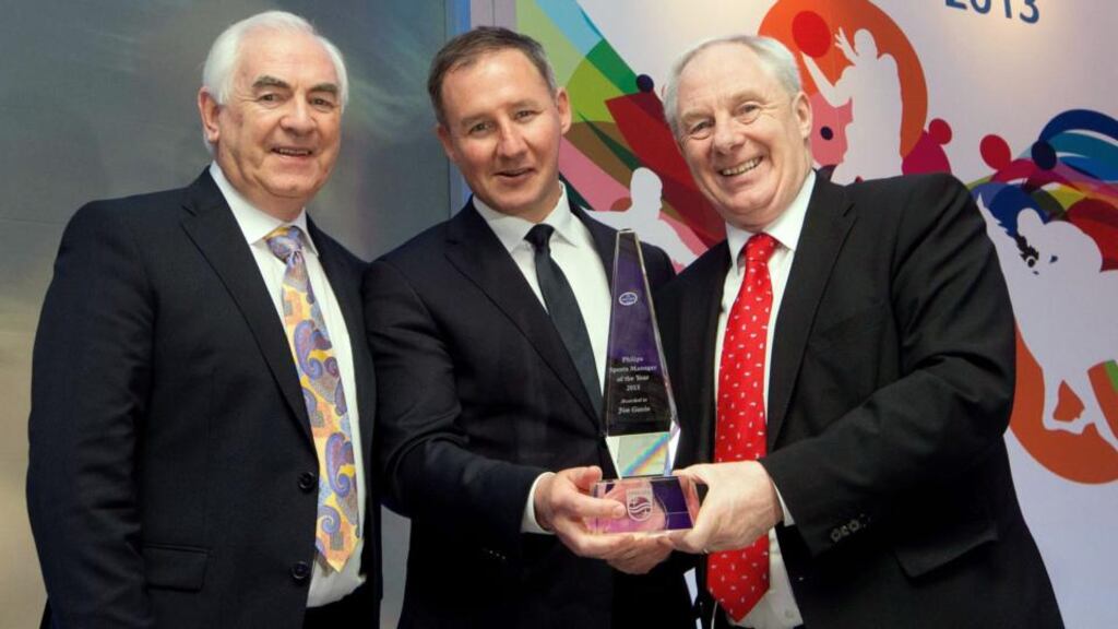 Jim Gavin receives his Philips Sports Manager of the Year award from Cel O’Reilly (Managing Director Philips Ireland) and Michael Ring TD, Minister of State for Sport, at a function in the Shelbourne Hotel. Photo: James Crombie/Inpho
