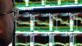 Markets edge lower ahead of key interest rate decisions