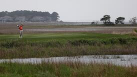 McDowell returns to world top 10 after  Heritage  playoff victory