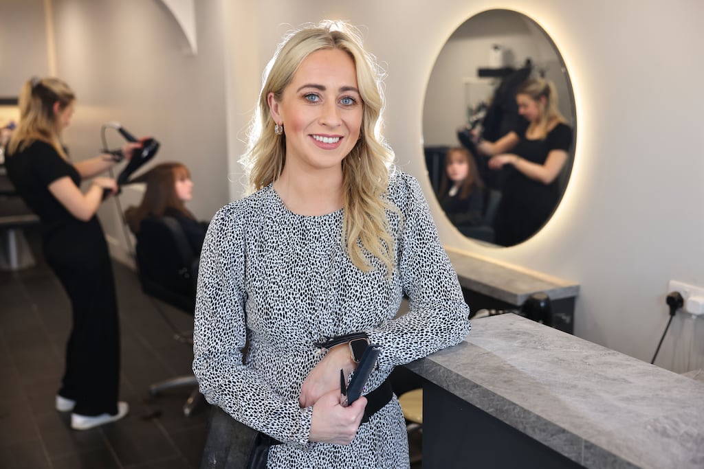Hairdresser Róisín O’Reilly: “At college, there’s a lot of book work ...that’s not what hairdressing is about ... it’s about hands-on learning." Photograph: Dara Mac Dónaill