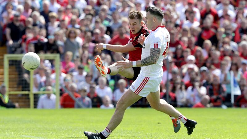 Down’s Darragh O’Hanlon kicks a goal chance wide during the Ulster final. Photo: Morgan Treacy/Inpho