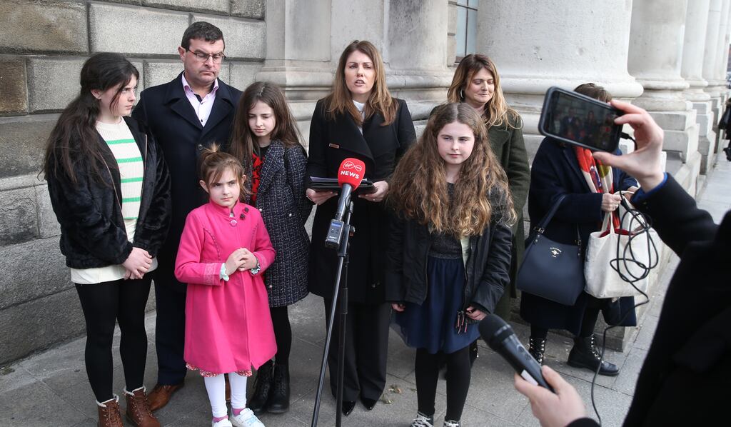 Solicitor Rachel O'Shaughnessy speaks to media on behalf of Rebecca and Tom Collins and their children Annie, Molly, Alice and Nancy after their High Court case.
Photograph: Collins Courts