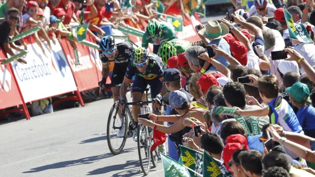Movistar’s Spanish cyclist Alejandro Valverde rounds the final bend ahead of Peter Sagan and Nicolas Roche to win the fourth stage of the 2015 Vuelta Espana. Photograph: Getty Images