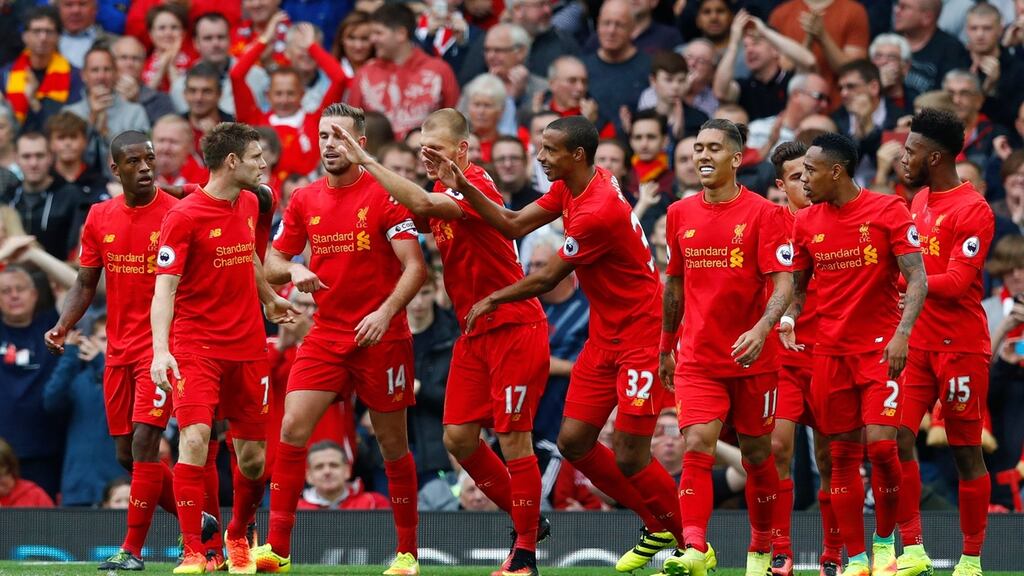 James Milner celebrates scoring Liverpool’s fifth goal. Photograph: Eddie Keogh/Reuters