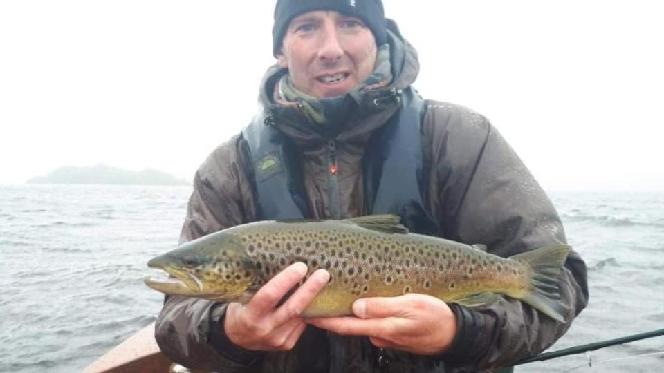 Chris Oliver from Navan with the 4lb trout he caught on the Corrib.
