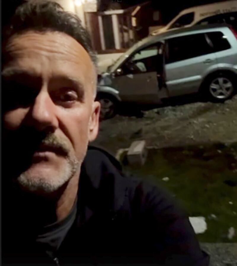Broadcaster Brendan Courtney with a car crashed into the front of his house in Wicklow town in the background. Photograph: @BrendanCourtney/Instagram