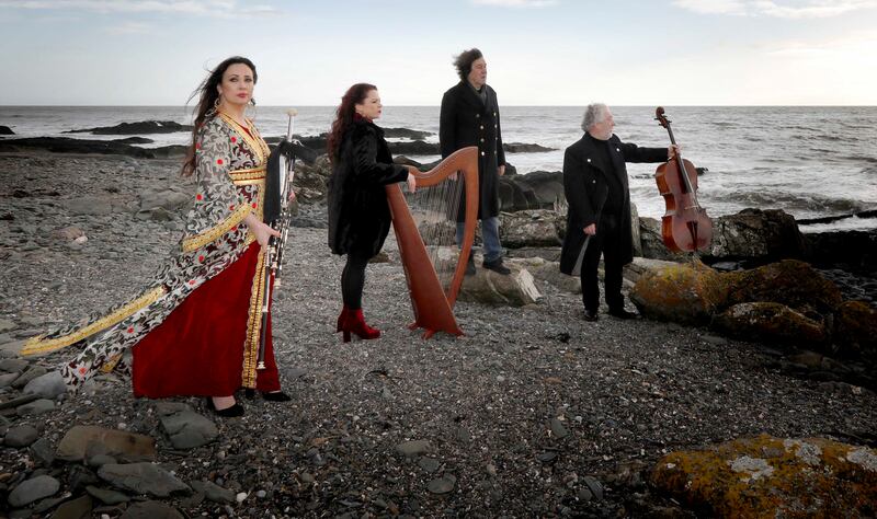 Stephen Rea, Louise (left) and Michelle Mulcahy and Neil Martin on Portane Beach, Fingal, where the RMS Tayleur – the ’Victorian Titanic’ - was wrecked off Lambay Island in January 1854. TradFest and Fingal County Council commissioned Neil Martin to compose a new suite of music, entitled 'Ocean Child', inspired by the miraculous survival of one anomoyous infant who was plucked from the sinking ship. Photograph: Mark Stedman