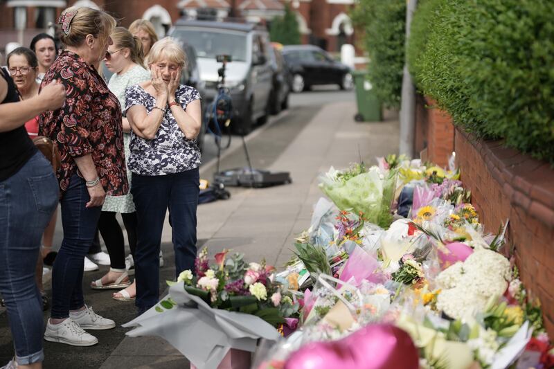 Flowers are laid in tribute to the child victims of a knife attack in Southport, northwest England, on Monday. Photograph: Christopher Furlong/Getty Images