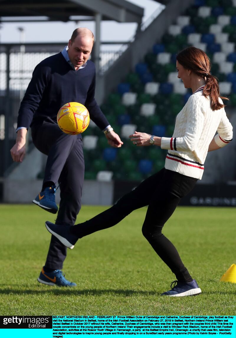 Prince William Duke of Cambridge and Catherine, Duchess of Cambridge, play football as they visit the National Stadium in Belfast. Photograph: Kelvin Boyes - Pool/Getty Images