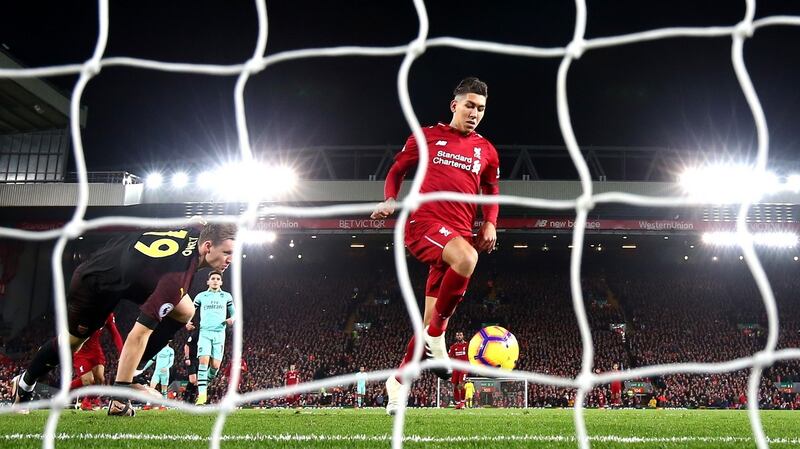 Firmino taps in Liverpool’s first. Photo: Clive Brunskill/Getty Images