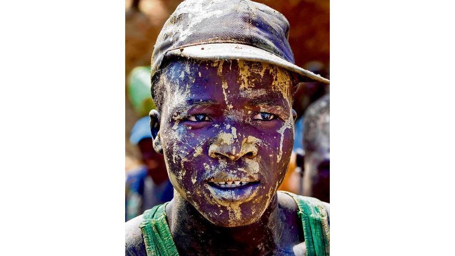 A miner just out of a shaft . Photographs: Michael Mac Sweeney/Provision