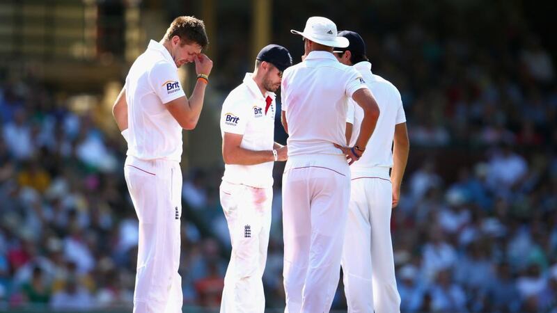 Boyd Rankin speaks to England captain Alastair Cook after he suffered a leg injury during day one of the fifth Ashes Test match against Australia at Sydney Cricket Ground on January 3rd, 2014. Photograph: Ryan Pierse/Getty Images