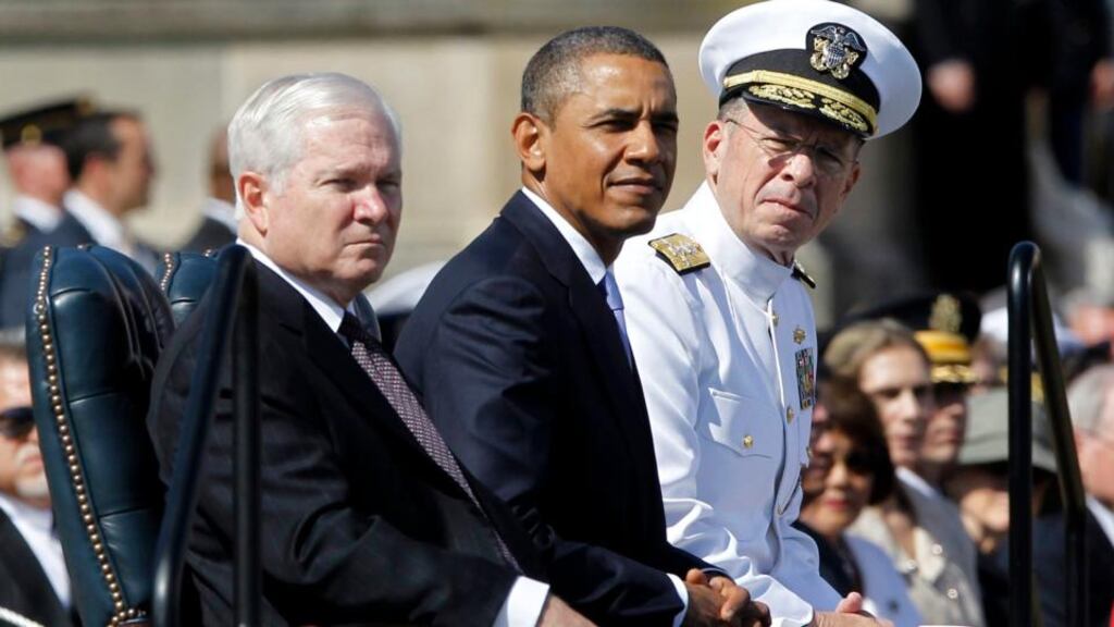 Robert Gates with Barack Obama and Admiral Mike Mullen at a Gates farewell ceremony. Photograph: Jason Reed/Reuters