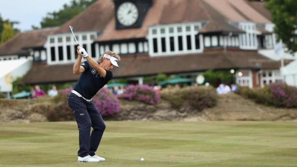 Bernhard Langer plays his second shot on the 18th hole during the first round of the British Senior Open at Sunningdale Golf Club. Photograph: Andrew Redington/Getty Images